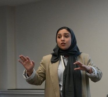 female lecturer in head scarf