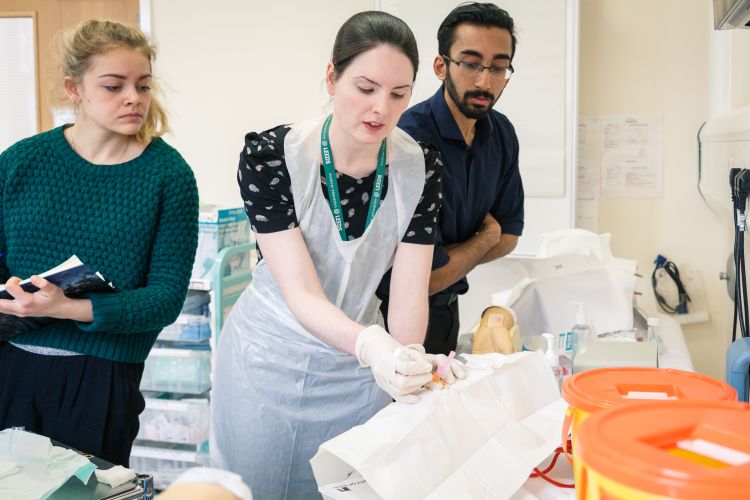 Image of two students being taught in Clinical Skills