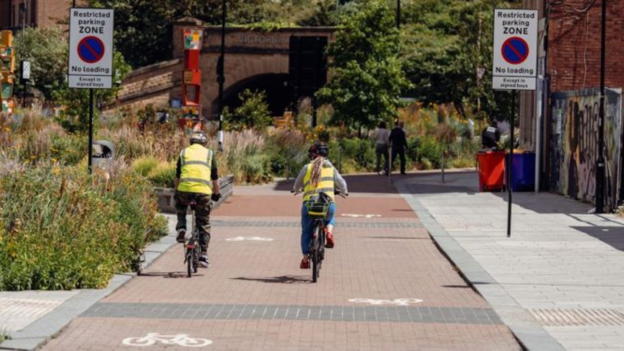 two people cycling