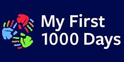 Three infants' handprints in a circle to the left of the text 'My First 1000 Days'