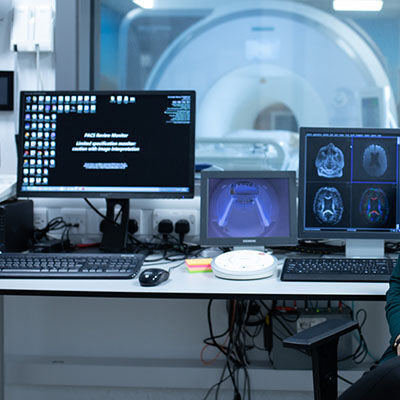 International licamm phd student next to MRI scanner