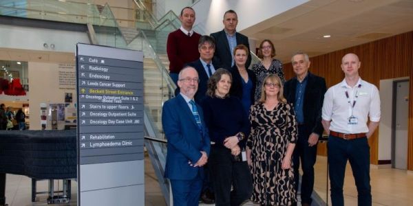 Members of the RadNet Leeds team standing in the Leeds General Hospital.