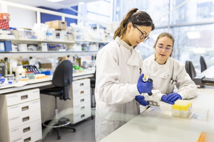 Two women in a lab setting