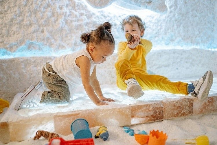 Children playing in sand