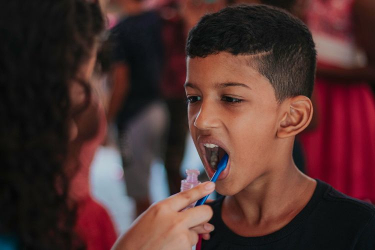 Boy having his teeth brushed