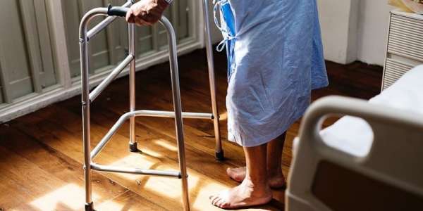 Elderly patient in hospital with a walking frame - Photo - Creative Commons CC0 1.0 Universal Public Domain Dedication.